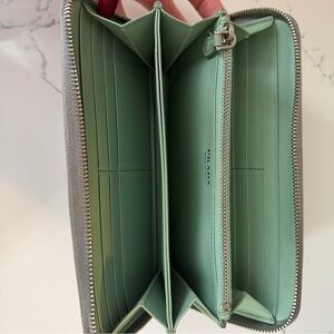 Authentic Prada Gray Leather wallet with mint interior